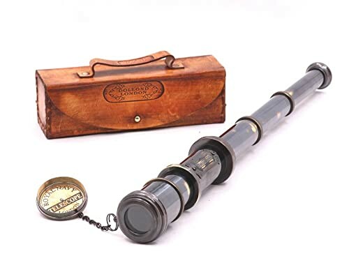 An antique brass telescope with wooden case